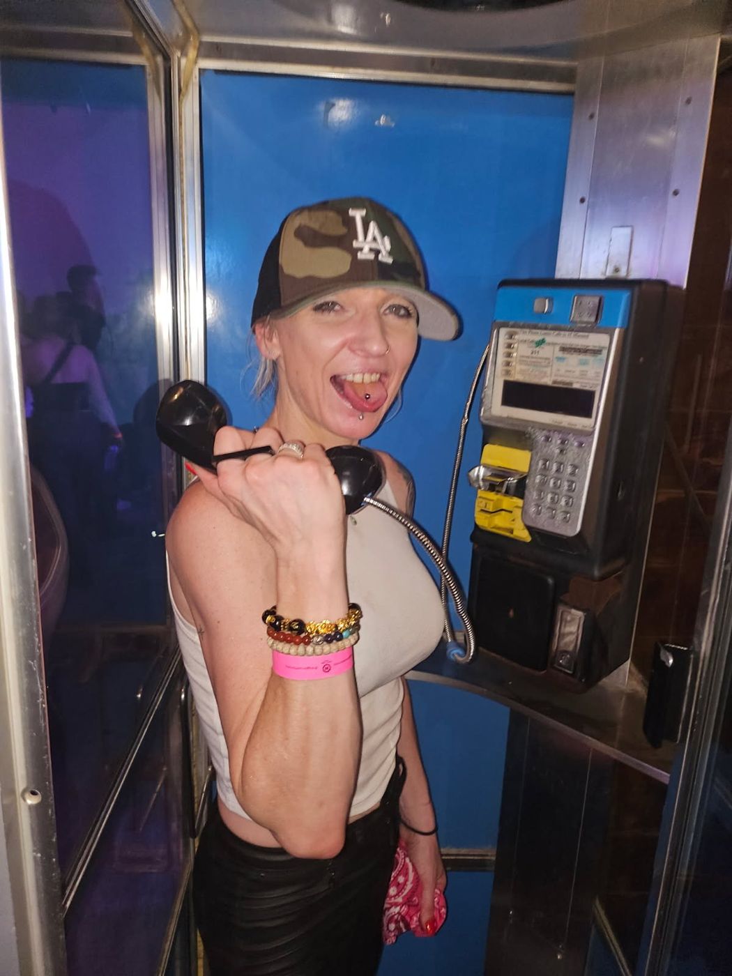 Bunny having fun in a phone booth